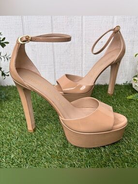 Stuart Weitzman
Discoplatform Nudistcurve Leather Sandals $495 Adobe size 8.5